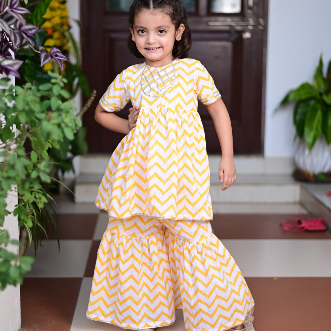 Yellow chevron Block Printed Cotton Sharara Kurta Set With Gota Embroidery For Girl