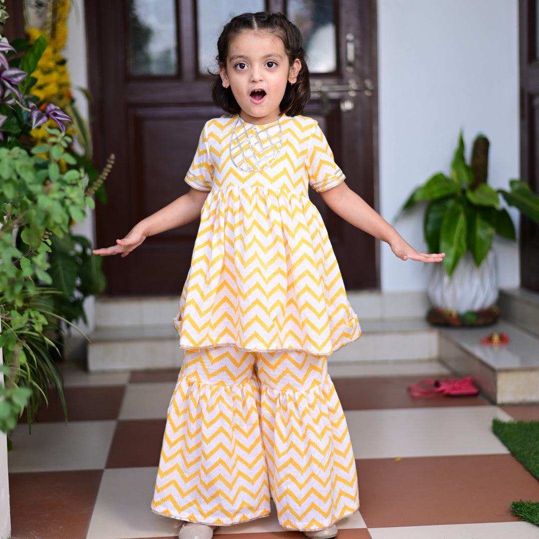 Yellow chevron Block Printed Cotton Sharara Kurta Set With Gota Embroidery For Girl
