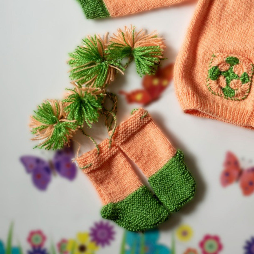 Peach Handknitted Woollen Set for infants.